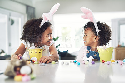 Buy stock photo Shot of two sisters playing together at home