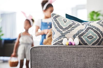 Buy stock photo Cropped shot of a back of Easter eggs on a sofa at home