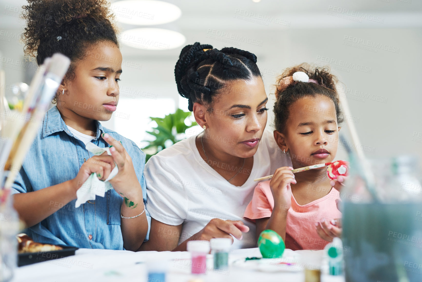 Buy stock photo Easter, mother or children with egg painting in home, creativity or craft activity for family bonding. Holiday tradition, festive decoration or woman with girls for art, learn or motor skills growth