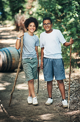 Buy stock photo Shot of two teenage boys exploring nature at summer camp