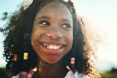 Buy stock photo Shot of a teenage girl having fun with colourful powder at summer camp