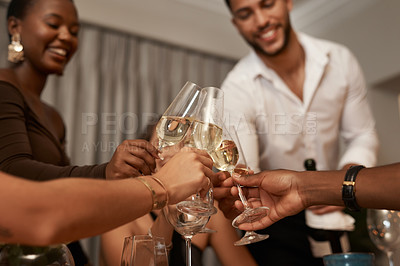 Buy stock photo Diverse group, champagne toast and New Years eve party in a house for fun and celebration. Wine, glasses and multiracial people celebrating and cheers with drink at a social gathering while partying