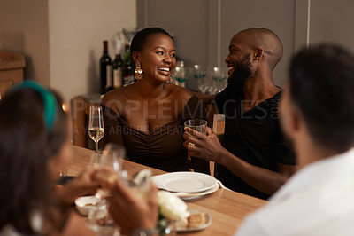 Buy stock photo Black couple, champagne and party celebration with friends for new years, Christmas or social holiday event dinner at house. Man and woman talking and happy with alcohol glass to celebrate at night