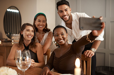 Buy stock photo Party, wine and selfie with friends at table of dining room for new year, celebration and festive holiday. Relax, smile and phone with group of people at home for social media, internet or technology