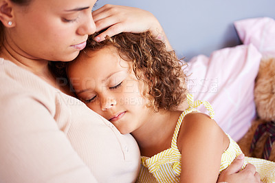 Buy stock photo Mother, girl child and hug in bed, comfort and relax with sleeping, bonding and love at family home. Calm, peace and woman with daughter for time together with trust, safety and security in childhood
