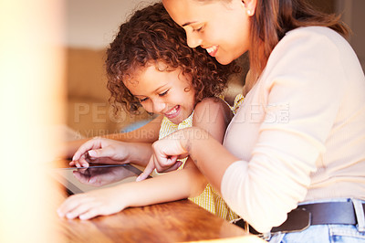 Buy stock photo Mom, child and tablet in home for virtual game, live streaming or video entertainment for online fun. Mother, girl and tech for digital education, smile or web learning for development for kid indoor