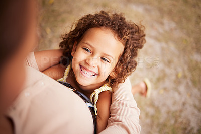Buy stock photo Shot of a little girl holding onto her parent