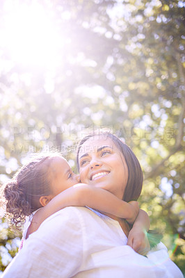 Buy stock photo Family, child and mother kiss outdoor in nature for summer fun with happiness, love and care. Woman or mom and happy girl kid playing together at a park for adventure, quality time and freedom