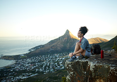 Buy stock photo Woman, mountain and sitting with view of cityscape outdoor for exercise in Cape Town. Female hiking, cliff and South Africa for adventure in nature in the morning for wellness on the weekend. 