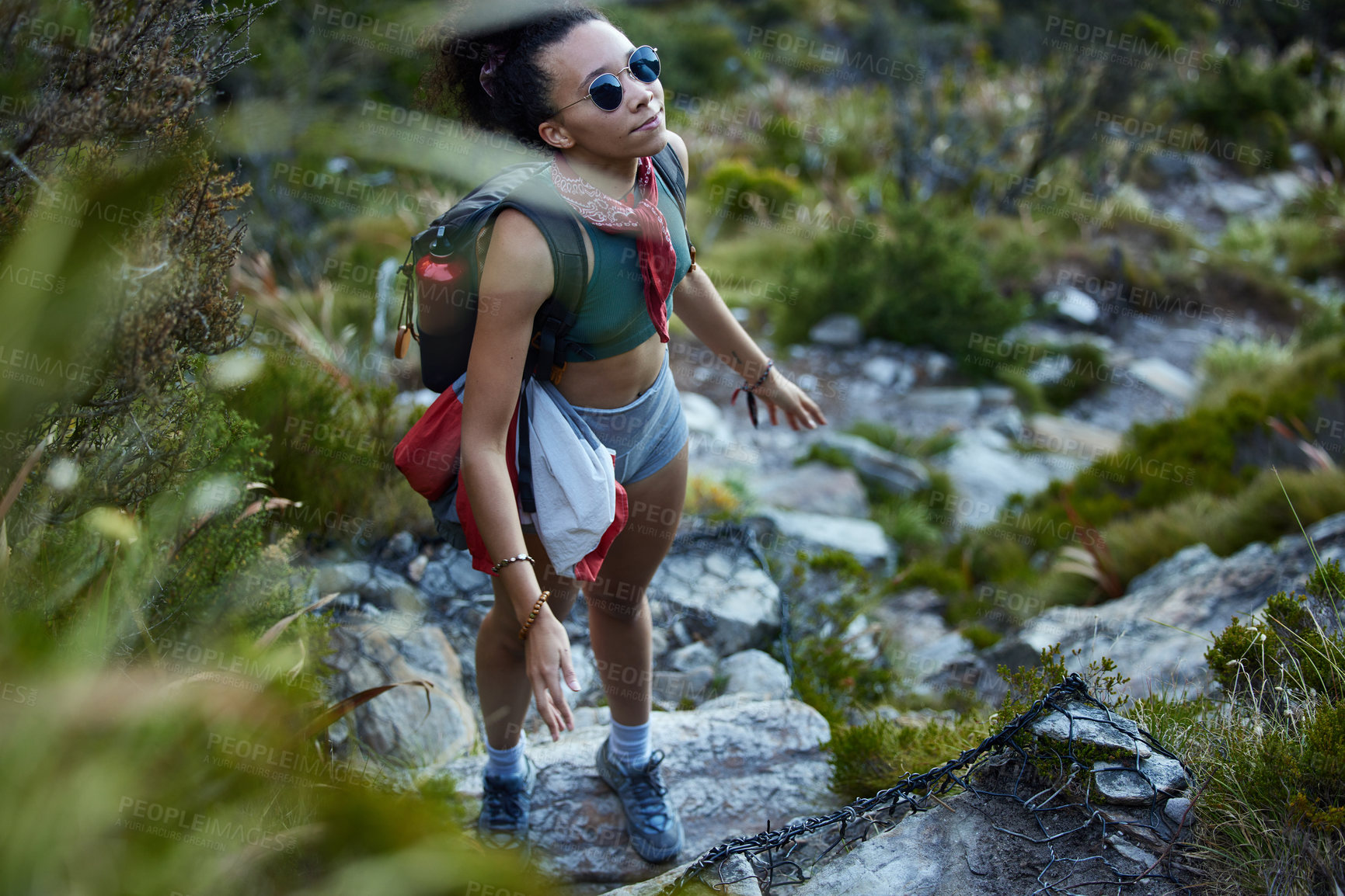 Buy stock photo Hiking, location and nature with woman in mountains for adventure, discovery or exploration. Backpack, environment and health with hiker person outdoor for exercise, fitness or recreation from above