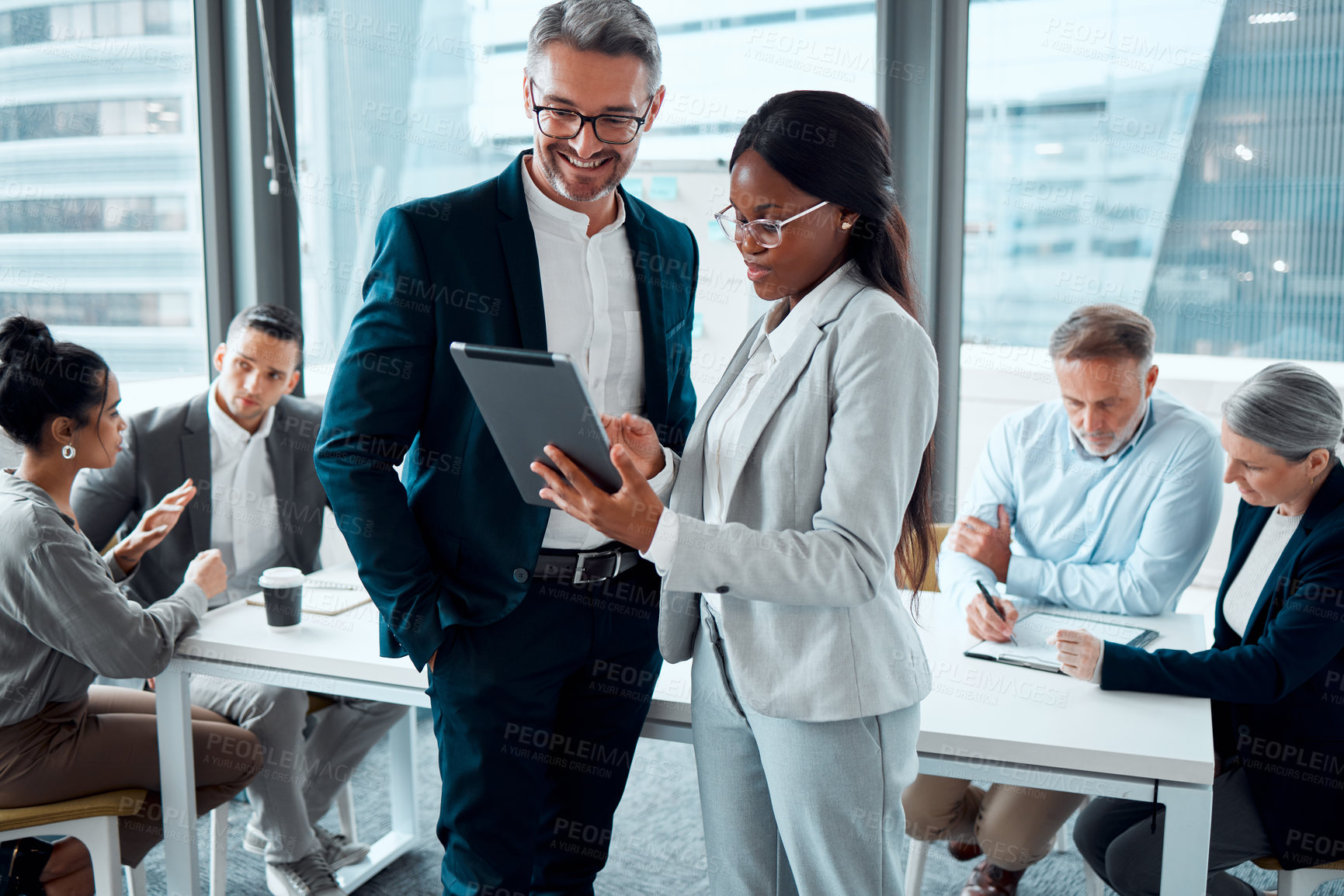 Buy stock photo Business people, tablet and conversation with ceo for planning and collaboration in office. Technology, teamwork and black woman with mentor in discussion, communication and research on digital app