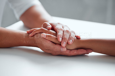 Buy stock photo Closeup shot of two unrecognisable people holding hands