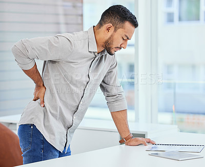 Buy stock photo Back pain, man and office worker with muscle injury and accident from stress and burnout. Hurt, medical issue and male employee with spine inflammation and anxiety from bruise at work feeling tired