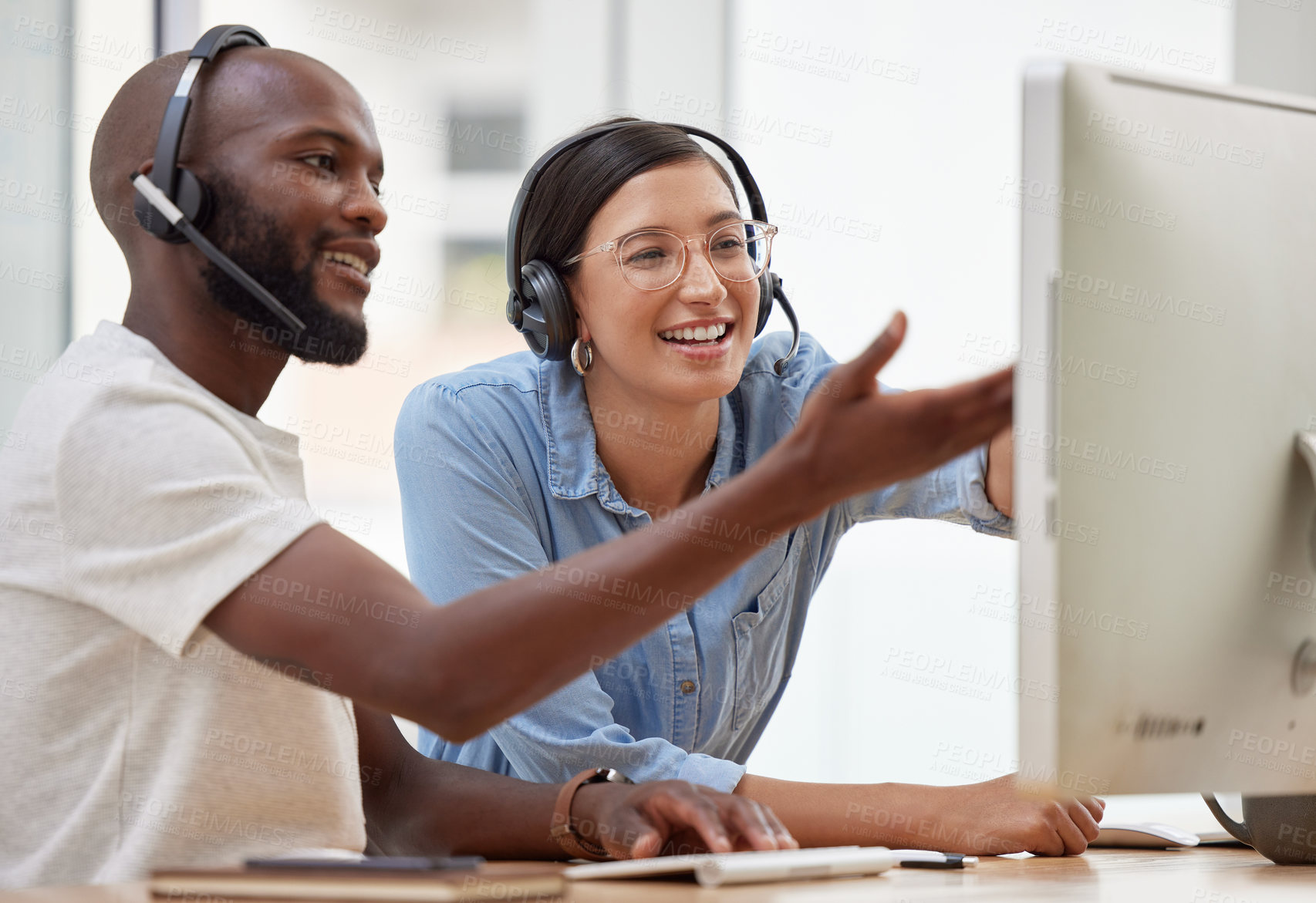 Buy stock photo Shot of two call center workers together