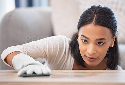 Buy stock photo Woman, home and spring cleaning or dusting surface of furniture for daily morning routine for hygiene and housekeeping. Girl, cloth and disinfecting for house maintenance or apartment and living room