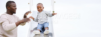 Buy stock photo Shot of a father and son playing in the park