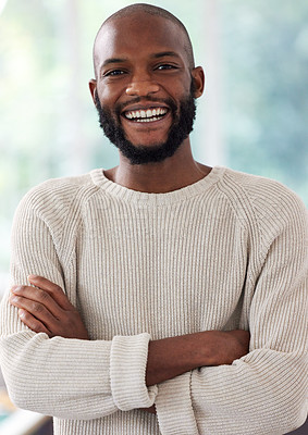 Buy stock photo African man, portrait and smile with arms crossed in home for relax, confidence or pride for weekend off. Black person, face and happy with casual fashion, cozy or comfortable in living room of house