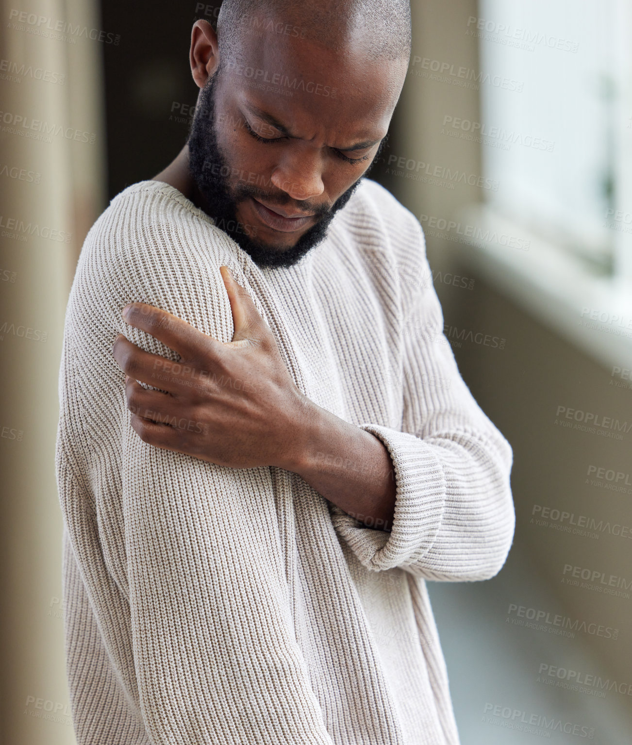 Buy stock photo Shoulder, pain and black man with injury, home and muscle tension with strain, health issue or emergency. Male person, accident or guy with medical problem, inflammation or joint with body tendinitis
