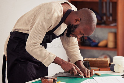 Buy stock photo Shoemaker, black man and tool to cut leather in workshop for creative skill, small business and craft. Professional, designer and person in warehouse with material and equipment for diy hand design