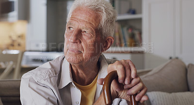 Buy stock photo Senior man, thinking and walking stick in house sitting on sofa for retirement, relax and comfort. Elderly person, happy and cane in home for peace, calm and pension while being nostalgic with vision
