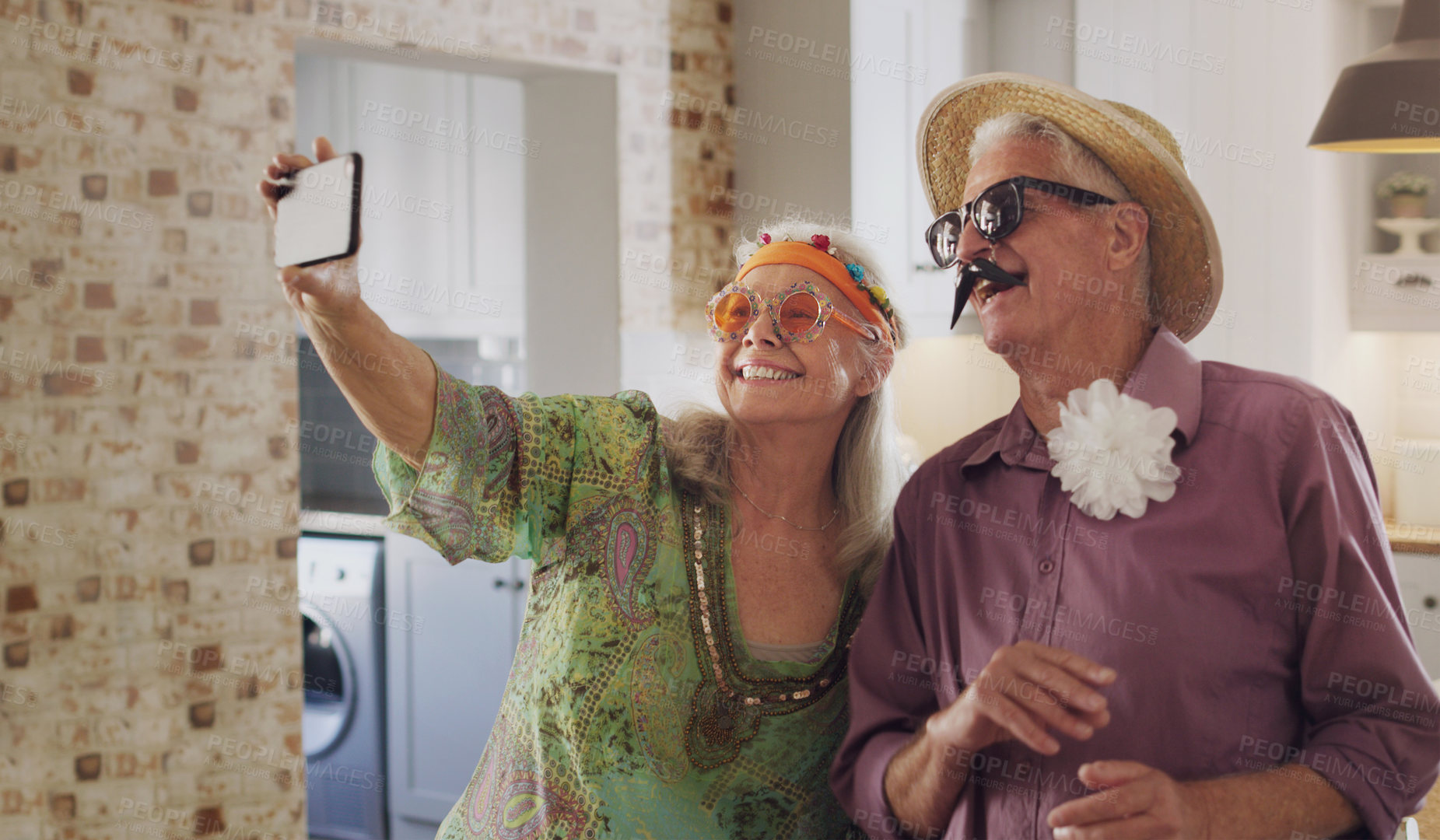 Buy stock photo Senior couple, selfie and costume in home, silly and goofy glasses for social media in retirement. Elderly people, capture moment and camera app for picture, photo and hipster accessories for fun