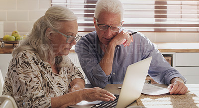 Buy stock photo Elderly couple, laptop and kitchen for research, financial budget and online investment for mortgage payment in retirement. Man, woman and serious with tech for planning strategy for internet banking