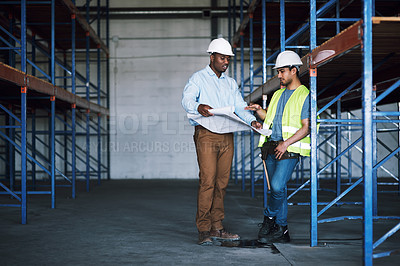 Buy stock photo Business people, blueprint and meeting in construction, team planning or ideas for building strategy on site. Architect men in teamwork discussion, floor plan or documents for industrial architecture