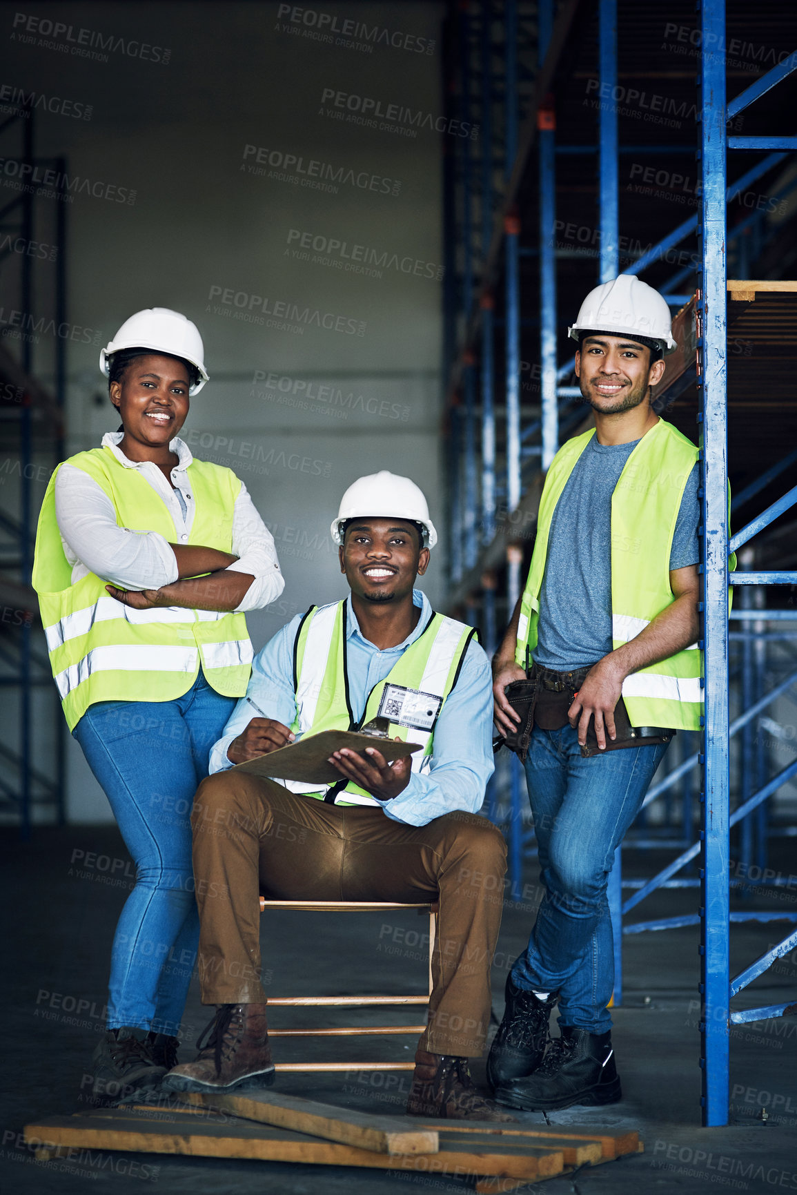 Buy stock photo Portrait of a group of builders working at a construction site