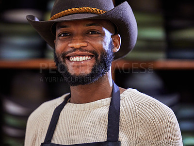 Buy stock photo African man, portrait and smile for tailor, small business owner and clothing workshop. Designer, hat and fashion product for boutique, retail and shopping startup for creative industry or store