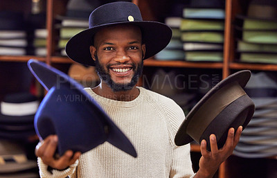 Buy stock photo Shot of a young man working at his job in a shop