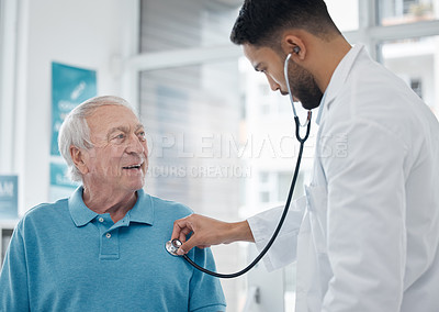 Buy stock photo Healthcare, senior man and doctor with a stethoscope, surgeon and innovation for diagnosis, treatment and talking. Medical professional, mature male person and elderly patient with cardiology expert
