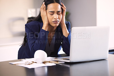 Buy stock photo Shot of a young businesswoman looking upset for spilling coffee over a laptop and paperwork on a table
