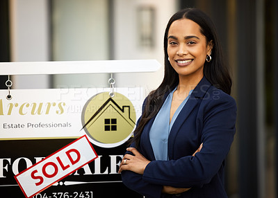 Buy stock photo Sold, real estate and woman in portrait with arms crossed for home investment, property sale and agency. Happy face of agent, realtor or biracial person with house sign or board in business success