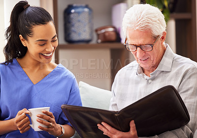 Buy stock photo Shot of a female nurse relaxing with her patient