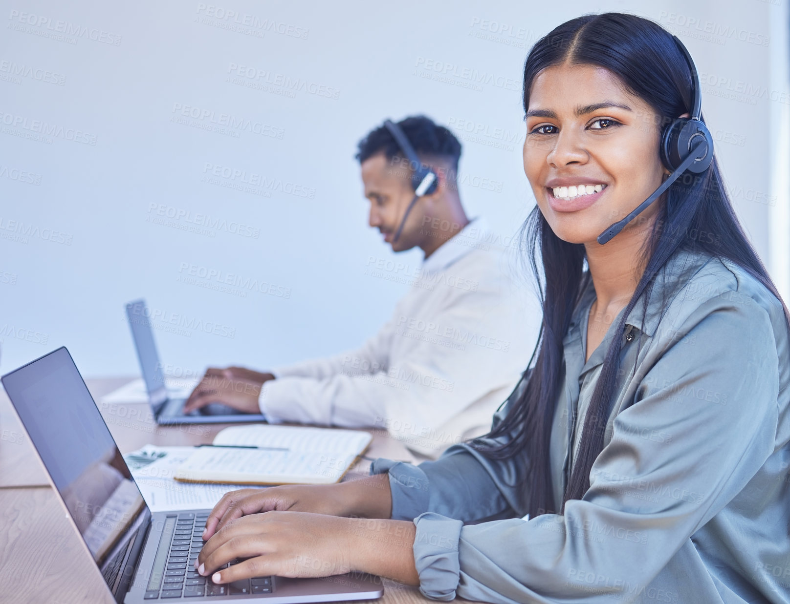 Buy stock photo Laptop, tech support or portrait of Indian woman in call center on headset for telemarketing consulting. Face, smile or consultant typing in telecom agency for communication, sales or advice online