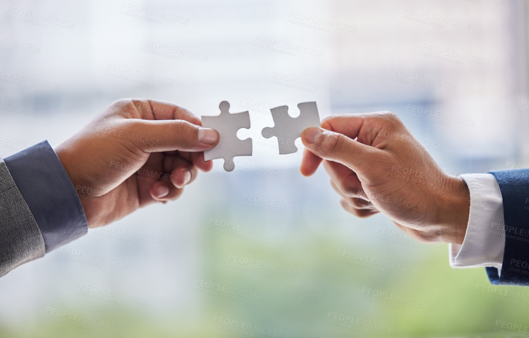 Buy stock photo Hands, collaboration and business people with puzzle in office for partnership or synergy with joint effort. Crm, corporate and teamwork with unity in company or trust with employees in Switzerland.