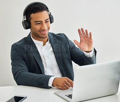 Buy stock photo Shot of a businessman on a video call in a modern office