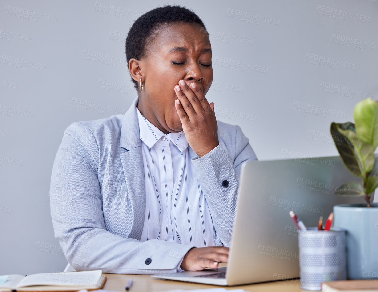 Buy stock photo Business, tired and black woman with burnout, yawning and laptop with deadline, overworked or low energy. African person, events planner or entrepreneur with pc, exhausted or fatigue in modern office