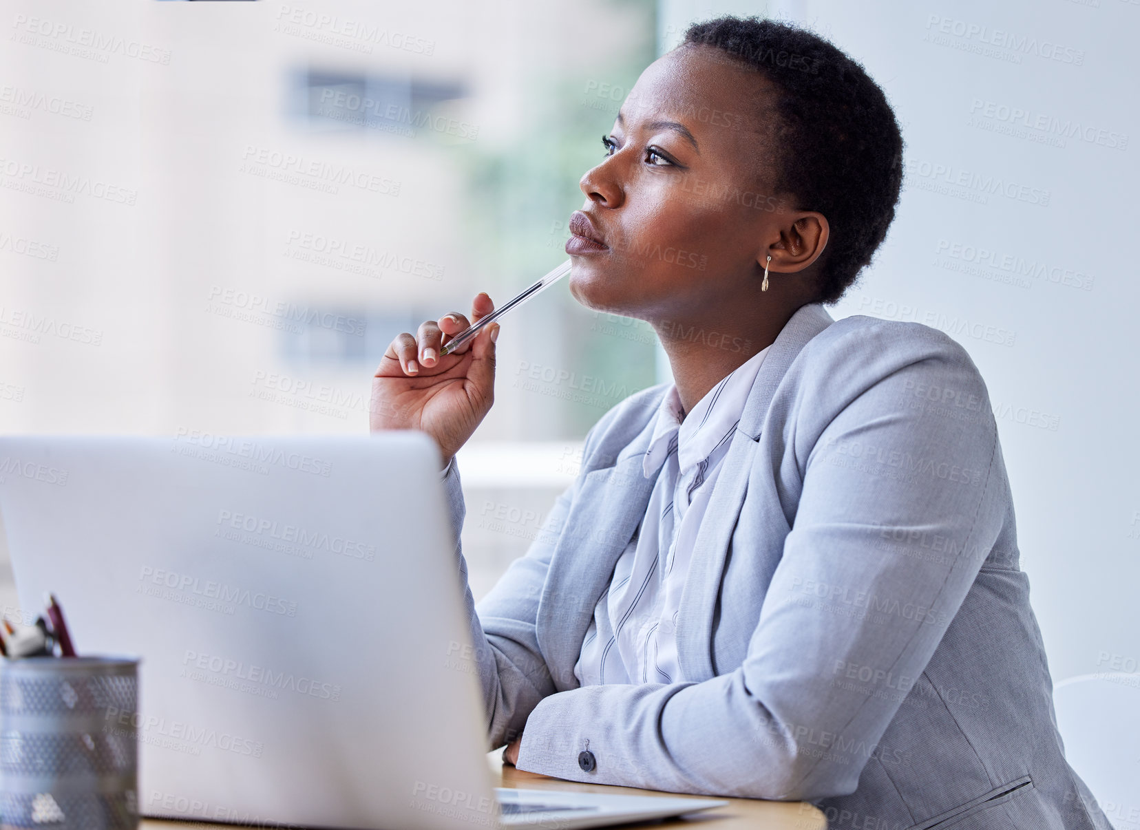 Buy stock photo Contemplating, business and black woman on laptop in office for planning, research and information with ideas for project solution. Thinking, female person and brainstorming update of finance report
