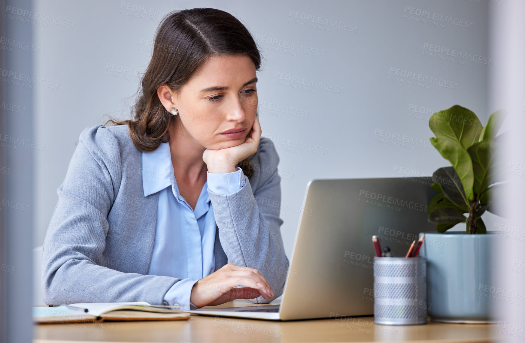 Buy stock photo Corporate, woman and bored with laptop for reading, research and planning in workplace. Technology, internet and scroll computer for social media, online app and female trader thinking in office 