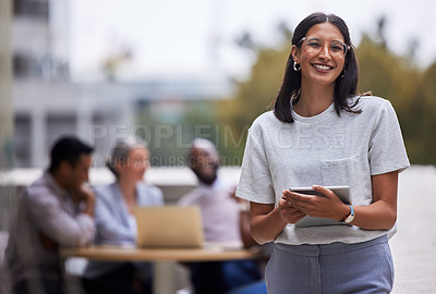 Buy stock photo Shot of a young businesswoman standing outside the office