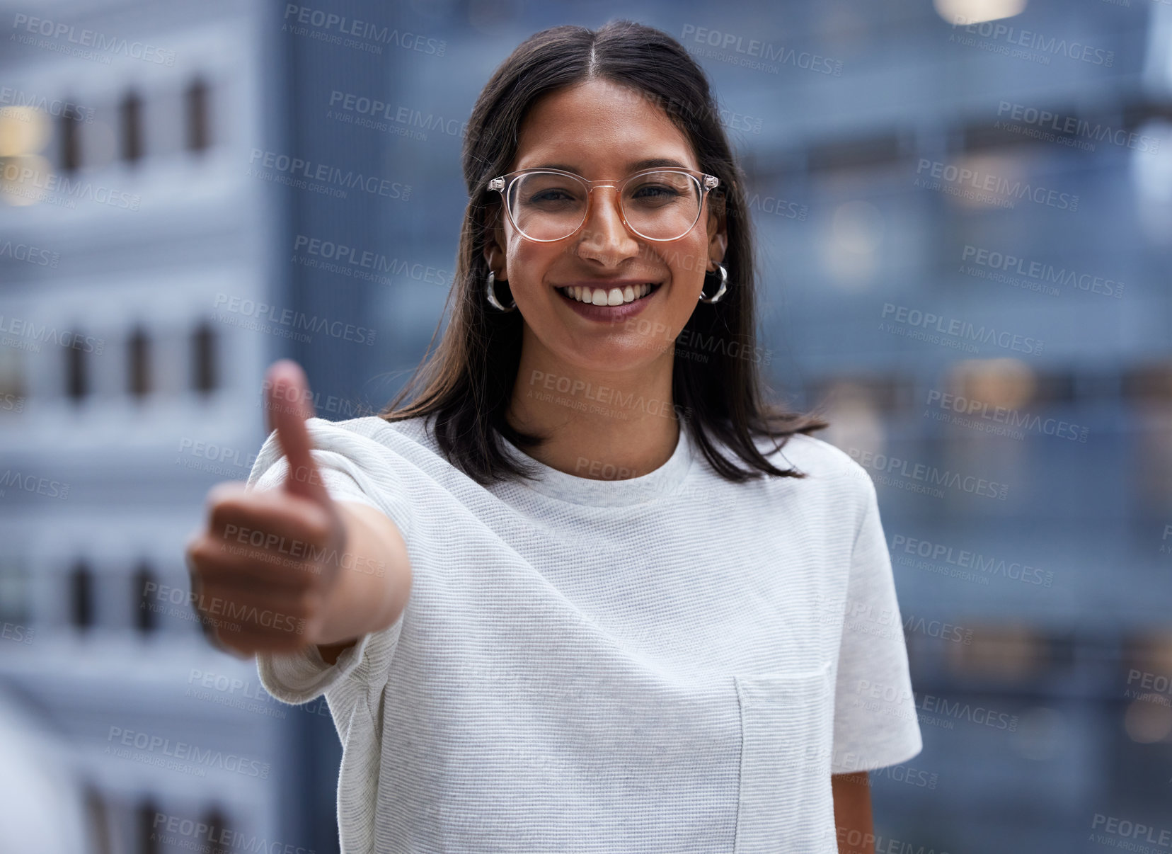 Buy stock photo Woman, smile and city outside with thumbs up for thank you with happy in portrait for winner in company. Promotion, good news and yes in workplace with positivity for career achievement in New York.