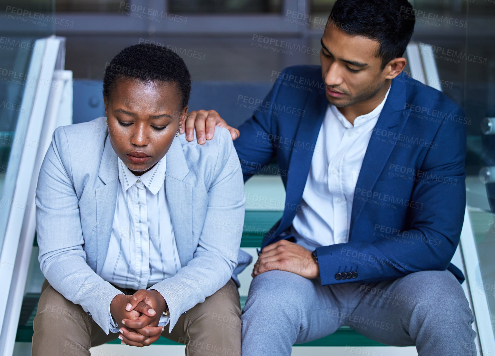 Buy stock photo Man, woman and support on shoulder in office for advice, helping others with feedback or problem. Male person, colleague and news for mental health at workplace, frustrated with burnout or depression