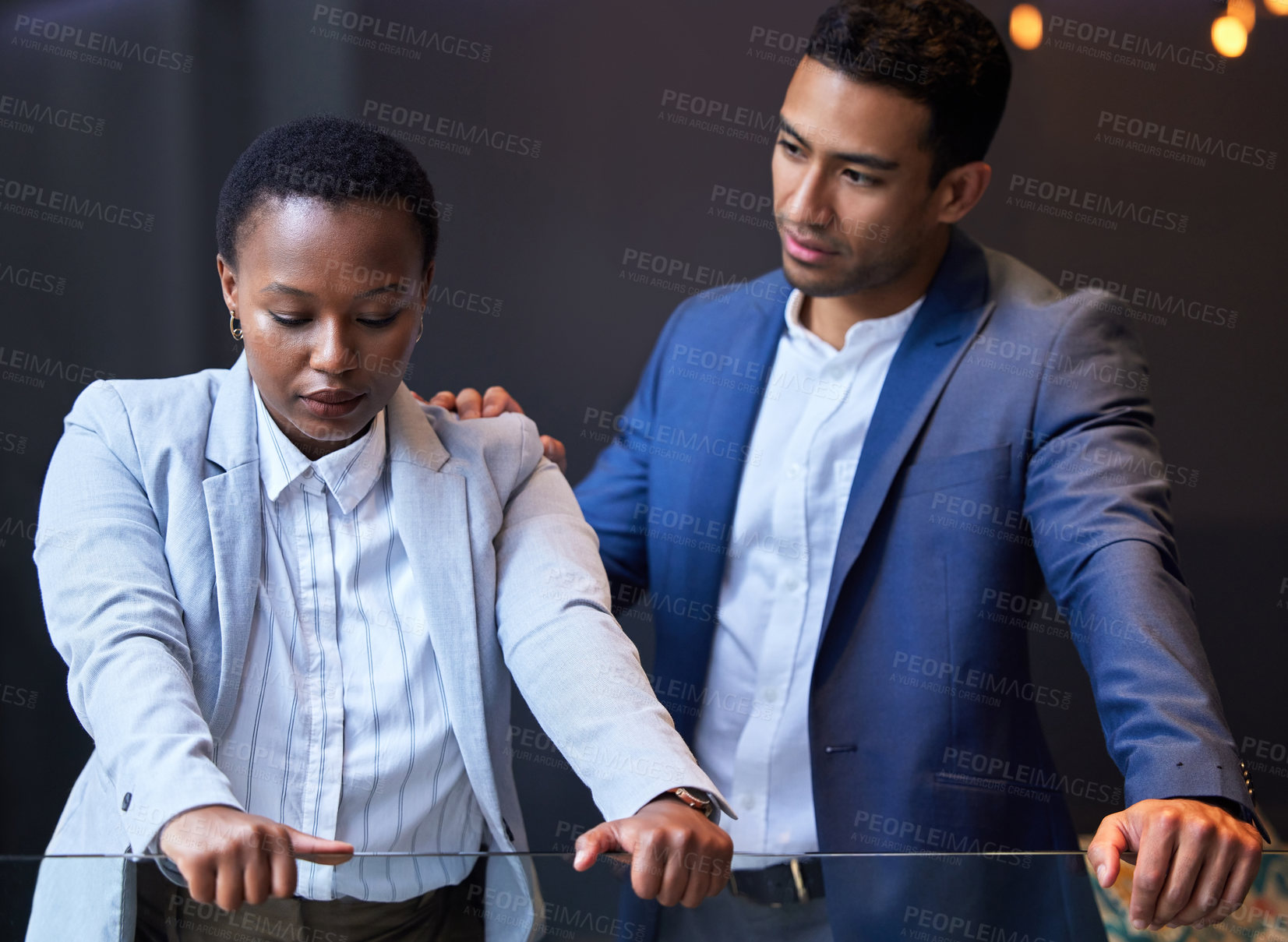 Buy stock photo Man, woman and help on shoulder in office for advice, support for friend with feedback or problem. Male person, colleague or news for mental health at workplace, frustrated with burnout or depression