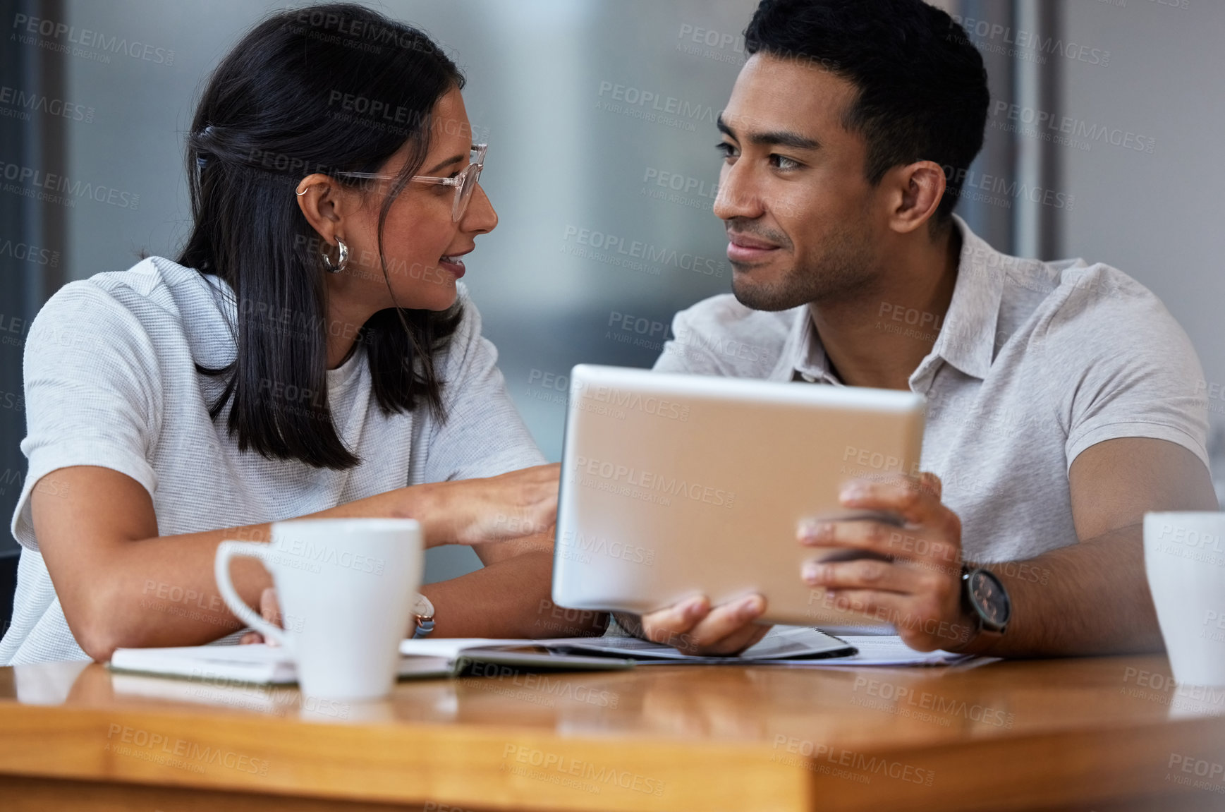 Buy stock photo Table, meeting and business people with tablet in office for research, communication and teamwork. Web design, employees and discussion with technology for brainstorming, ux planning or collaboration