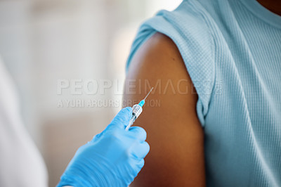 Buy stock photo Shot of a doctor about to inject the arm of a patient