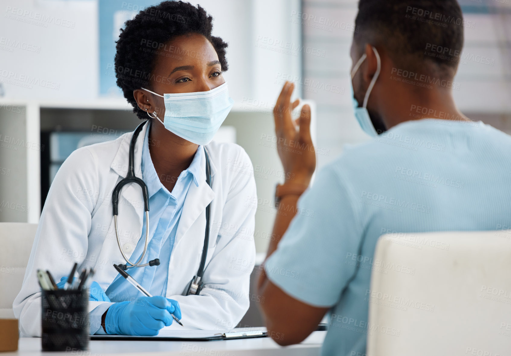 Buy stock photo Shot of a doctor having a consultation with a patient