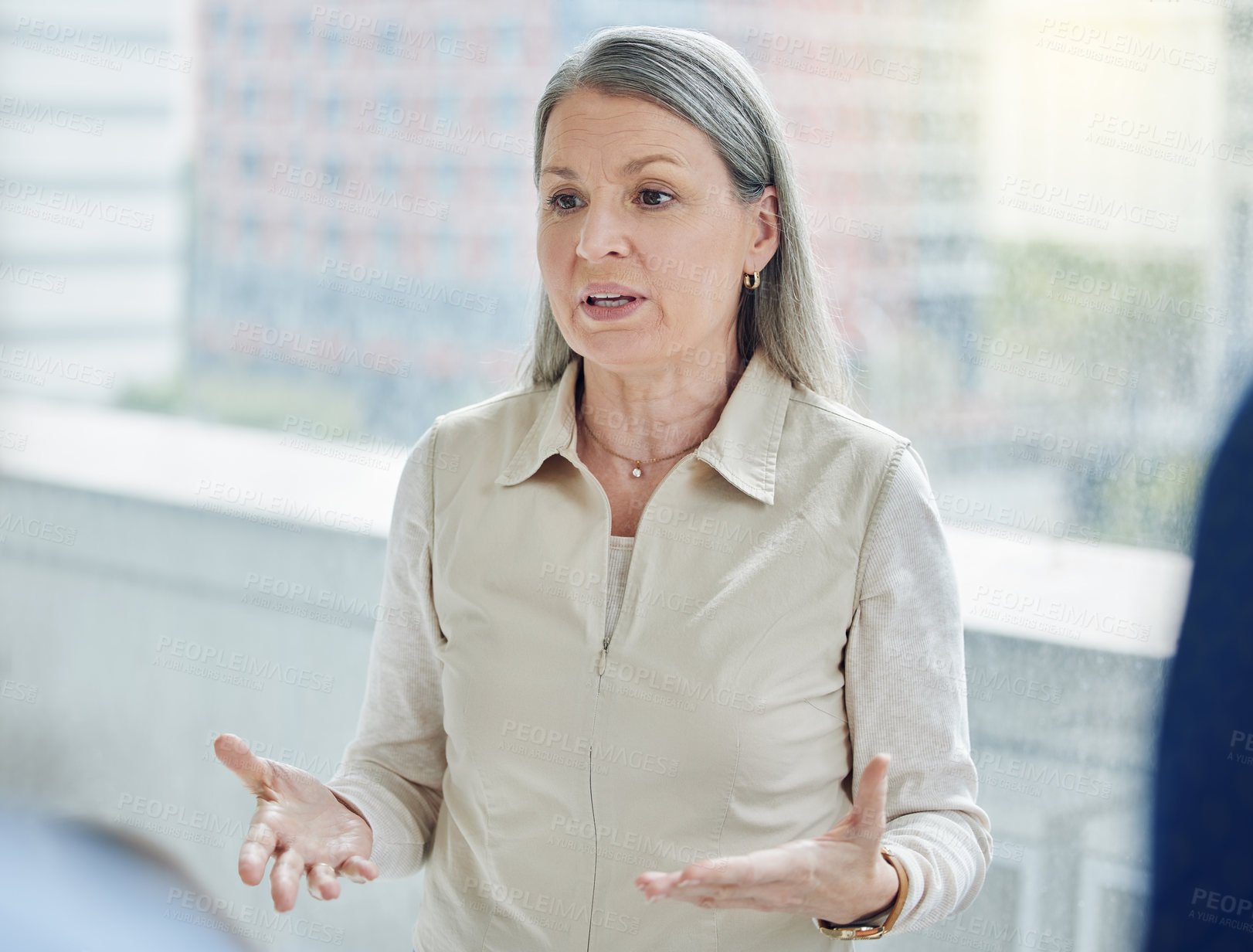 Buy stock photo Business woman, presentation and meeting for workshop mentorship, support or ideas and manager for company. Training, coaching and agenda with mature executive talking to employees group at work