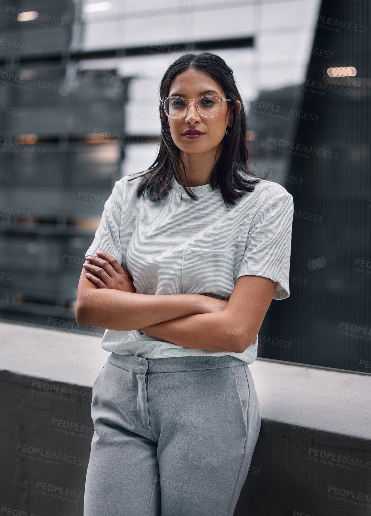 Buy stock photo Woman, confident and portrait of worker on balcony at office outdoor in city to relax for break. Employee, glasses and crossed arms in urban town for creative business career as editor or publisher