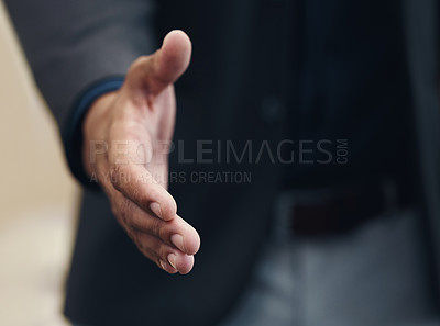 Buy stock photo Cropped shot of an unrecognizable businessman extending his arm towards the camera for a handshake